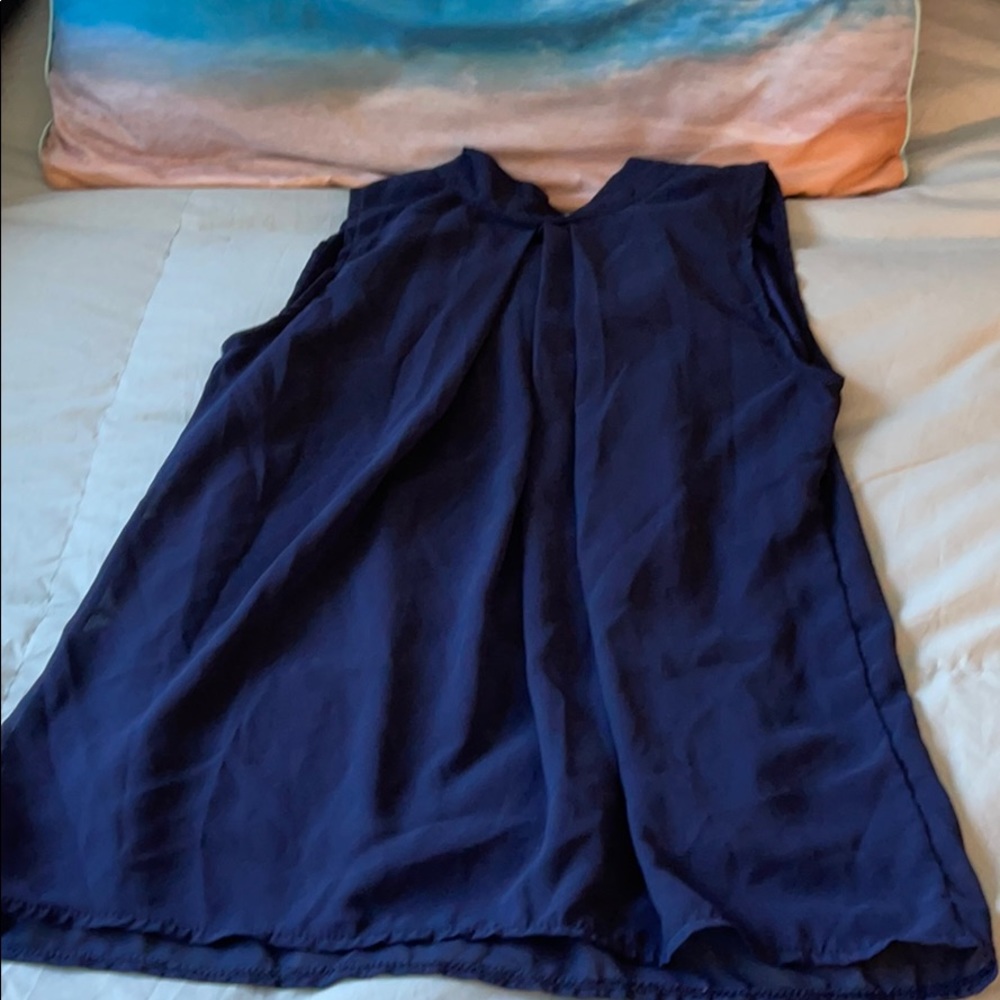 Blue sleeveless blouse